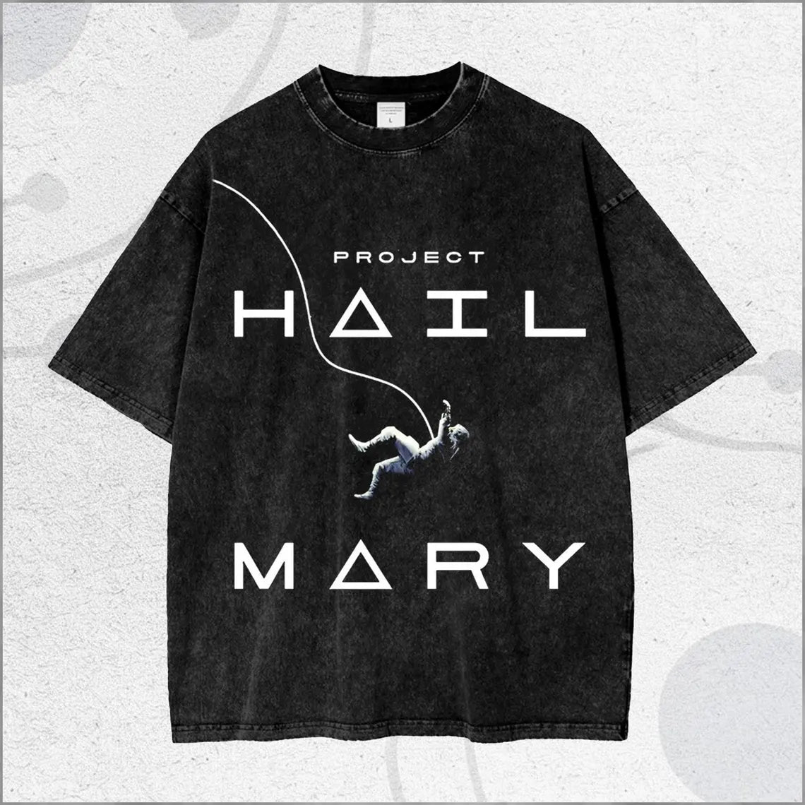 Black t-shirt with 'Project Hail Mary' graphic on a textured white background